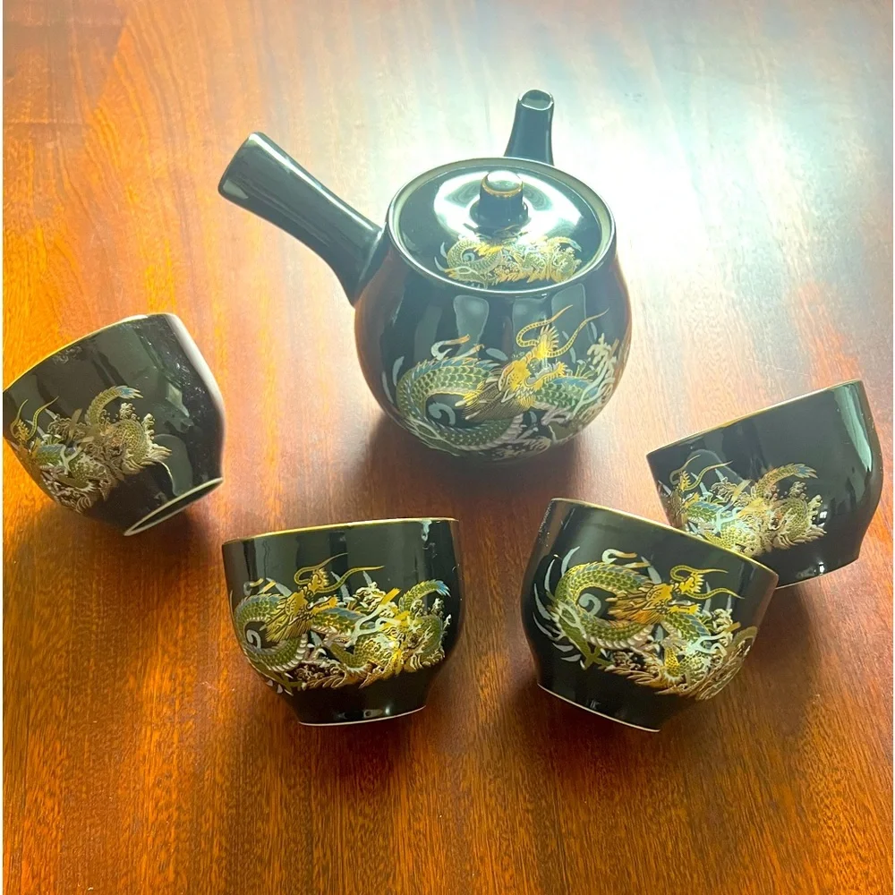 Japanese 7 piece tea set with 5 cups and a tea pot in gold dragon pattern